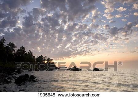 Stock Photography - sunset on the south shores of lake superior; michigan, united states of america. Fotosearch
