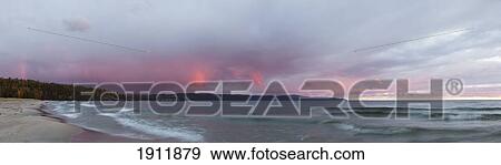 Stock Photo - sunset over lake superior; wawa, ontario, canada. Fotosearch