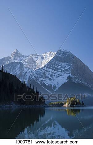 the upper lake at sunrise; kananaskis, alberta, canada View Large Photo Image Stock Image - the upper lake at sunrise; kananaskis, alberta, canada. Fotosearch