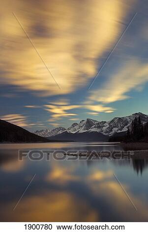 the upper lake at sunset; kananaskis, alberta, canada View Large Photo Image Stock Image - the upper lake at sunset; kananaskis, alberta, canada. Fotosearch