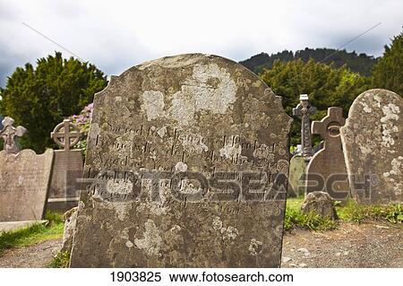 tombstones in a cemetery on a 6th century monastic site; glendalough, county wicklow, ireland View Large Photo Image Stock Photography - tombstones in a cemetery on a 6th century monastic site; glendalough, county wicklow, ireland. Fotosearch
