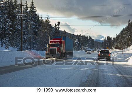 traffic after a snow storm on mount hood; oregon, united states of america View Large Photo Image Stock Image - traffic after a snow storm on mount hood; oregon, united states of america. Fotosearch