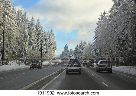 traffic after a snow storm on mount hood; oregon, united states of america View Large Photo Image Stock Image - traffic after a snow storm on mount hood; oregon, united states of america. Fotosearch