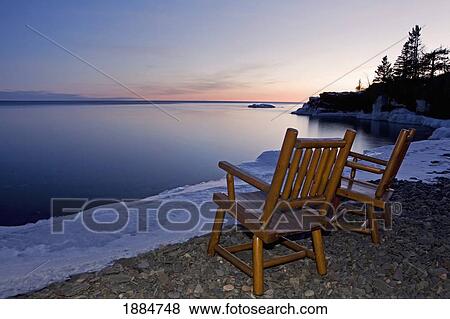 two chairs at water's edge looking out over lake superior; grand portage, minnesota, united states of america View Large Photo Image Stock Photo - two chairs at water's edge looking out over lake superior; grand portage, minnesota, united states of america. Fotosearch