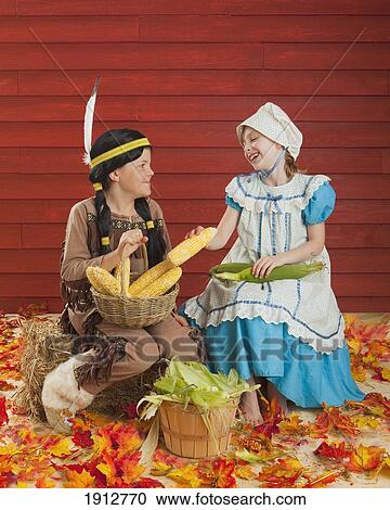 two children in costume to celebrate the harvest for thanksgiving; three hills, alberta, canada View Large Photo Image Stock Image - two children in costume to celebrate the harvest for thanksgiving; three hills, alberta, canada. Fotosearch