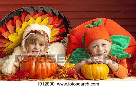 two children wearing turkey and tomato costumes; three hills, alberta, canada View Large Photo Image Stock Image - two children wearing turkey and tomato costumes; three hills, alberta, canada. Fotosearch