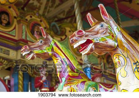 two colorful painted horses on a carousel; beamish, durham, england View Large Photo Image Picture - two colorful painted horses on a carousel; beamish, durham, england. Fotosearch
