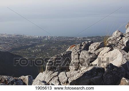 view of the coast from a hill top; marbella, malaga, andalusia, spain View Large Photo Image Stock Image - view of the coast from a hill top; marbella, malaga, andalusia, spain. Fotosearch