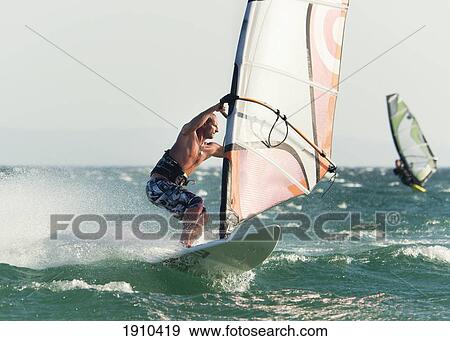 Stock Photo - windsurfing; tarifa, cadiz, andalusia, spain. Fotosearch