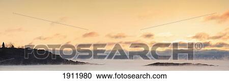 winter mist on lake superior at sunrise; terrace bay, ontario, canada View Large Photo Image Stock Image - winter mist on lake superior at sunrise; terrace bay, ontario, canada. Fotosearch