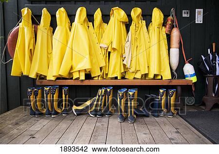 yellow raincoats and rubber boots lined up; tofino, british columbia, canada View Large Photo Image Stock Image - yellow raincoats and rubber boots lined up; tofino, british columbia, canada. Fotosearch