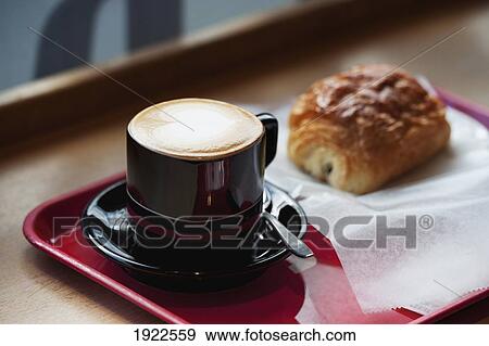 Stock Photo - a hot drink and a sweet treat; tokyo, japan. Fotosearch
