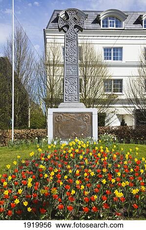 A Monument With A Cross In Front Of A Building; Killarney, County Kerry, Ireland View Large Photo Image Stock Photograph - A Monument With A Cross In Front Of A Building; Killarney, County Kerry, Ireland. Fotosearch