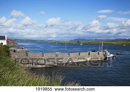 Boat At End Of Dock; Rosses Point, County Sligo, Ireland View Large Photo Image Stock Photography - Boat At End Of Dock; Rosses Point, County Sligo, Ireland. Fotosearch