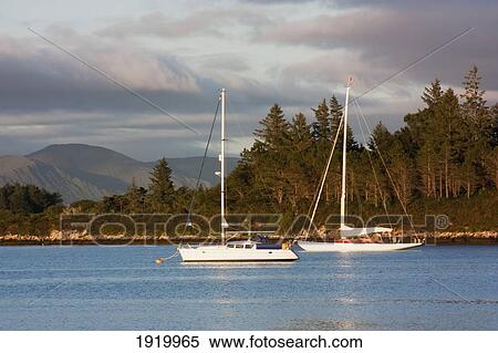 Boats In Oysterbed Harbour; Sneem, County Kerry, Ireland View Large Photo Image Stock Photography - Boats In Oysterbed Harbour; Sneem, County Kerry, Ireland. Fotosearch