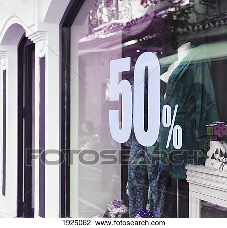 Stock Image - boutique offering 50% off sale; marbella, malaga province, costa del sol, spain. Fotosearch