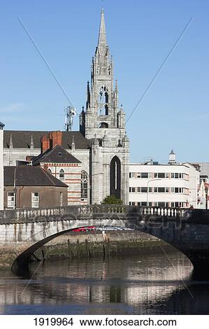Church Tower And Buildings Along A River; Cork City, County Cork, Ireland View Large Photo Image Picture - Church Tower And Buildings Along A River; Cork City, County Cork, Ireland. Fotosearch