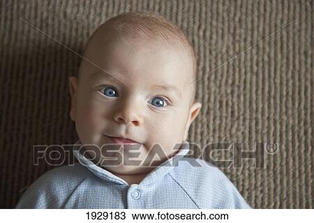 Stock Image - close-up of a baby's face. Fotosearch