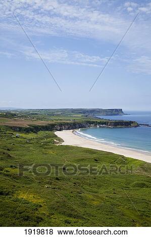 Coastal Landscape Of White Park Bay; Portbraddon, County Antrim, Northern Ireland View Large Photo Image Stock Photo - Coastal Landscape Of White Park Bay; Portbraddon, County Antrim, Northern Ireland. Fotosearch