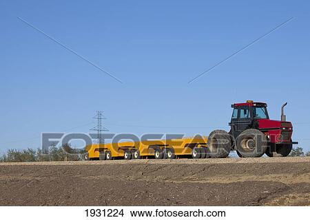 Picture - compacting equipment for new road construction; edmonton, alberta, canada. Fotosearch