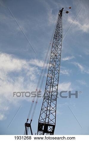 Stock Photo - construction crane against sky; st. albert, alberta, canada. Fotosearch