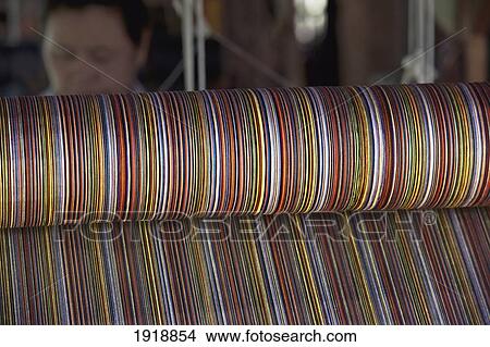 Picture - cotton weaving; chiang mai, thailand. Fotosearch