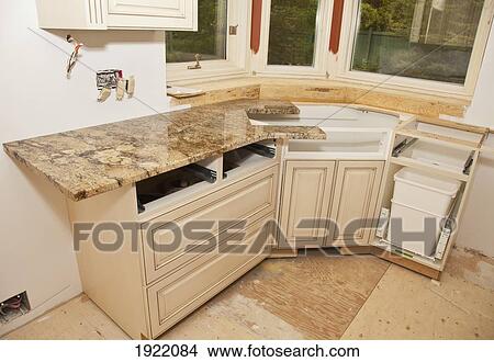 Picture - countertop installation in a home renovation; st. albert, alberta, canada. Fotosearch