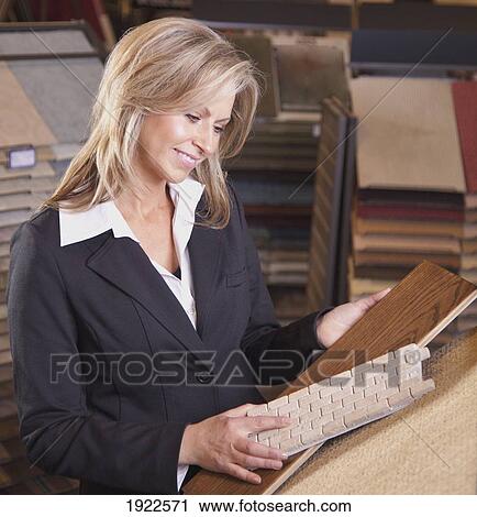 customer choosing floor coverings in a retail flooring store; edmonton, alberta, canada View Large Photo Image Stock Image - customer choosing floor coverings in a retail flooring store; edmonton, alberta, canada. Fotosearch