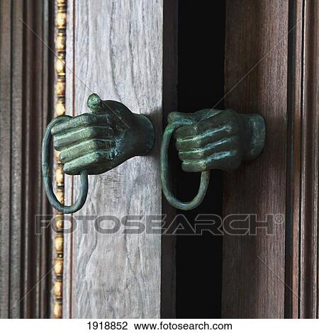 Stock Image - detail of door handle of mandarin oriental dhara dhevi hotel; chiang mai, thailand. Fotosearch