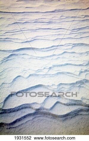 detail of ripple pattern in the snow at sunrise; calgary, alberta, canada View Large Photo Image Stock Image - detail of ripple pattern in the snow at sunrise; calgary, alberta, canada. Fotosearch