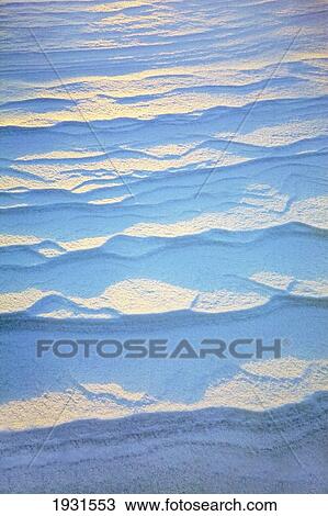 detail of ripple pattern in the snow at sunrise; calgary, alberta, canada View Large Photo Image Stock Image - detail of ripple pattern in the snow at sunrise; calgary, alberta, canada. Fotosearch