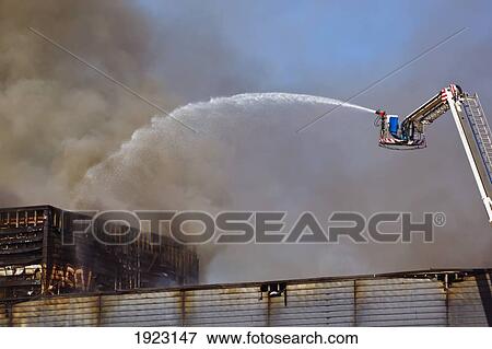 fighting fire which burned down the magic palace on february 18, 2011 with remote controlled hose on ladder; torremolinos, malaga province, costa del sol, spain View Large Photo Image Stock Photo - fighting fire which burned down the magic palace on february 18, 2011 with remote controlled hose on ladder; torremolinos, malaga province, costa del sol, spain. Fotosearch