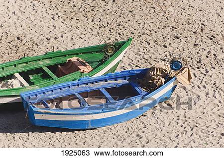 Stock Image - fishing boats on beach; calahonda beach, nerja, malaga, andalusia, spain. Fotosearch
