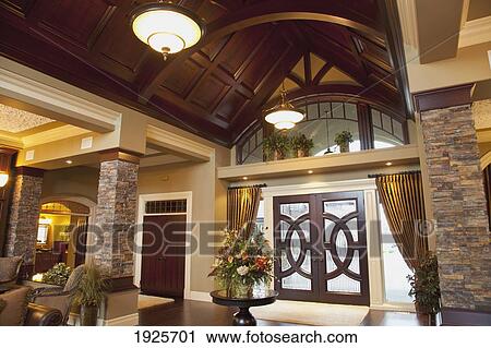 front entrance and vaulted ceiling in luxurious show home; st. albert, alberta, canada View Large Photo Image Stock Image - front entrance and vaulted ceiling in luxurious show home; st. albert, alberta, canada. Fotosearch