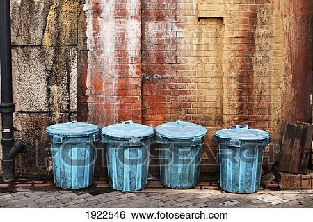 garbage cans lined up along a wall in an alley; tokyo, japan View Large Photo Image Stock Photograph - garbage cans lined up along a wall in an alley; tokyo, japan. Fotosearch