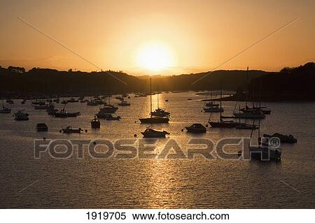 Stock Photography - Harbour Sunset With Boats; Crosshaven Harbour, County Cork, Ireland. Fotosearch