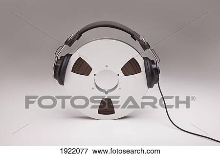 headphones on a reel of recording tape View Large Photo Image Stock Photo - headphones on a reel of recording tape. Fotosearch