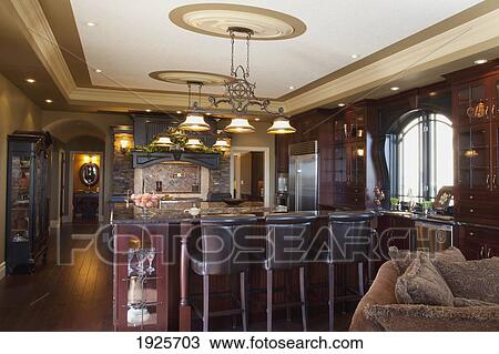 Stock Image - kitchen area in luxurious show home, st. albert, alberta, canada. Fotosearch