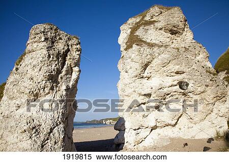 Landmark Rock Formations On Beach; White Rocks Beach, Portrush, Country Antrim, Northern Ireland View Large Photo Image Stock Photography - Landmark Rock Formations On Beach; White Rocks Beach, Portrush, Country Antrim, Northern Ireland. Fotosearch