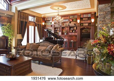 Stock Photograph - living room and study of luxurious home; st. albert, alberta, canada. Fotosearch