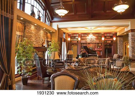 Stock Image - luxurious estate home dining room and living room; st. albert, alberta, canada. Fotosearch