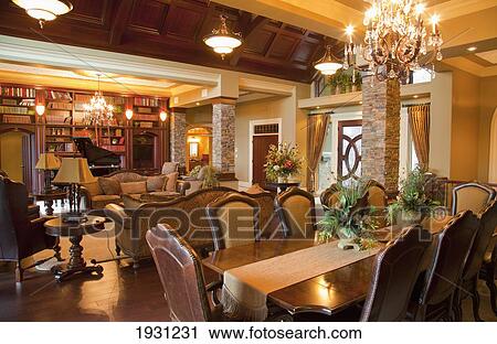 Stock Image - luxurious estate home dining room and living room; st. albert, alberta, canada. Fotosearch