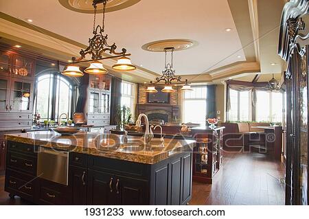 Stock Image - luxurious estate home kitchen and island, st. albert, alberta, canada. Fotosearch