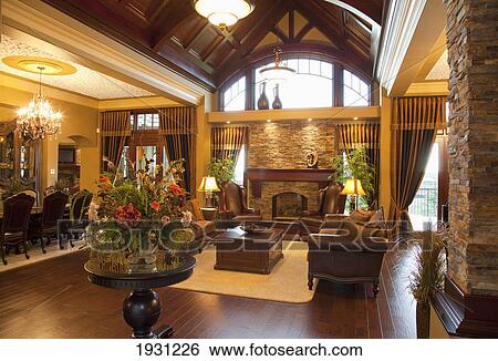 Stock Photograph - luxurious estate home living room and dining room; st. albert, alberta, canada. Fotosearch