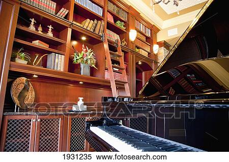 Stock Photography - luxurious estate home study with piano; st. albert, alberta, canada. Fotosearch