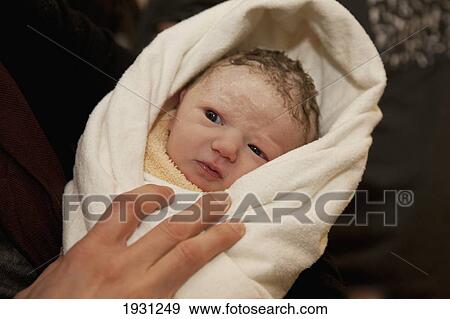 mother looking at newborn baby girl; edmonton, alberta, canada View Large Photo Image Stock Photo - mother looking at newborn baby girl; edmonton, alberta, canada. Fotosearch
