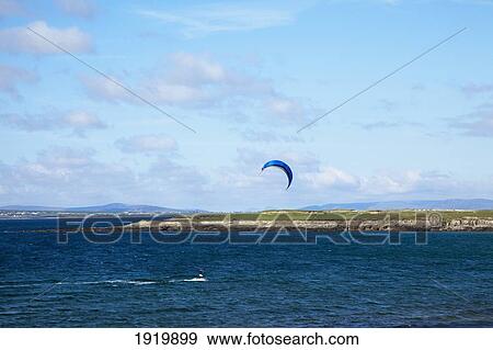 Ocean Kitesurfing; Doogort Beach, Achill Island, County Mayo, Ireland View Large Photo Image Stock Photo - Ocean Kitesurfing; Doogort Beach, Achill Island, County Mayo, Ireland. Fotosearch