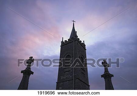 Old Belfry Against Sunset; Thomastown, County Kilkenny, Ireland View Large Photo Image Stock Photograph - Old Belfry Against Sunset; Thomastown, County Kilkenny, Ireland. Fotosearch