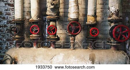 Stock Image - pipes and valves in 798 art zone; beijing, china. Fotosearch