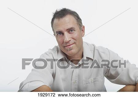 portrait of man against white background View Large Photo Image Stock Image - portrait of man against white background. Fotosearch